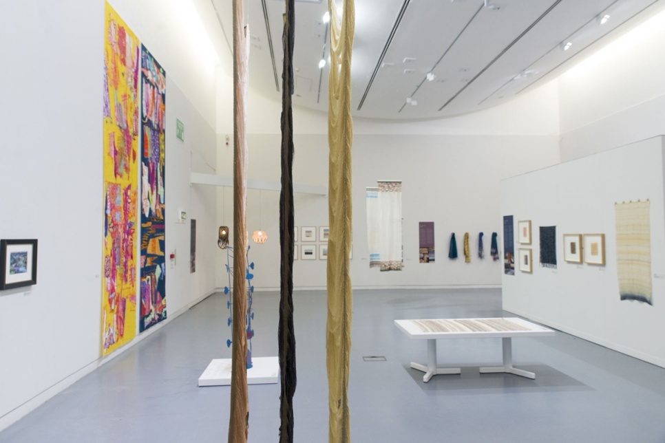 Art gallery with paintings hung on the wall